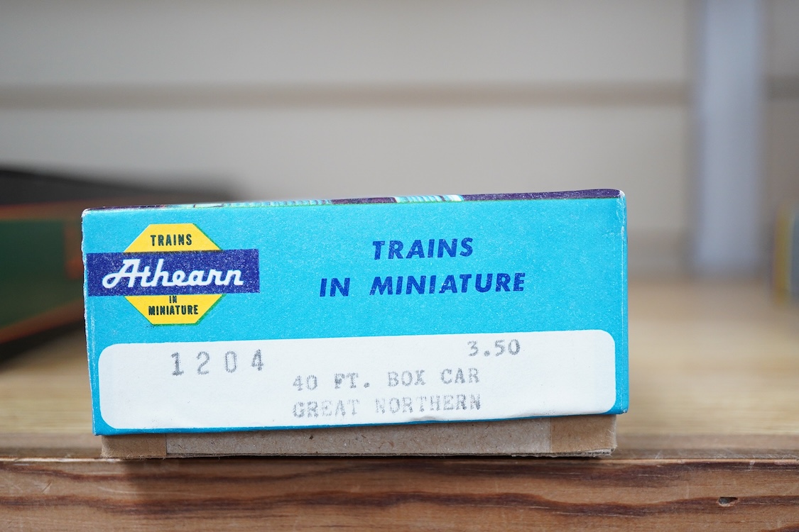 A quantity of US outline HO railway by Athearn, Bachmann, etc. including three locomotives; a Union Pacific Bo-Bo diesel, 1468, a Santa Fe Bo-Bo diesel, 5707, and a Santa Fe 0-4-0 tender engine, together with a 12-wheel